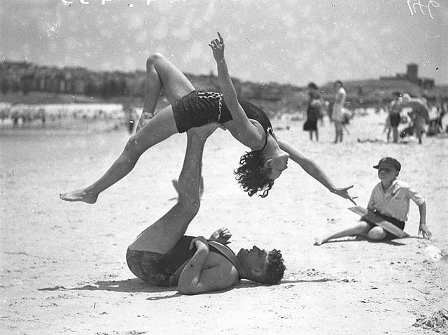 https://commons.wikimedia.org/wiki/File:Mr_J_Prentice_and_Miss_J_Howat_doing_acrobatics,_Bondi_Beach,_Jan_1935_-_by_Ted_Hood_(3072281873).jpg